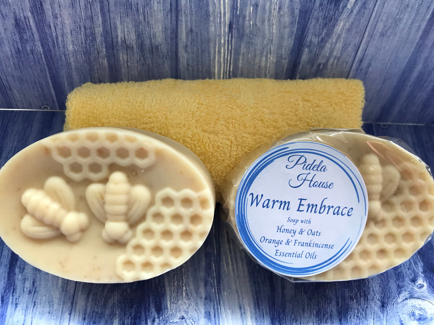 NEW! Warm Embrace oval soap bar, featuring bees, honeycomb or flowers with Honey & Oats and Orange & Frankincense Essential Oils